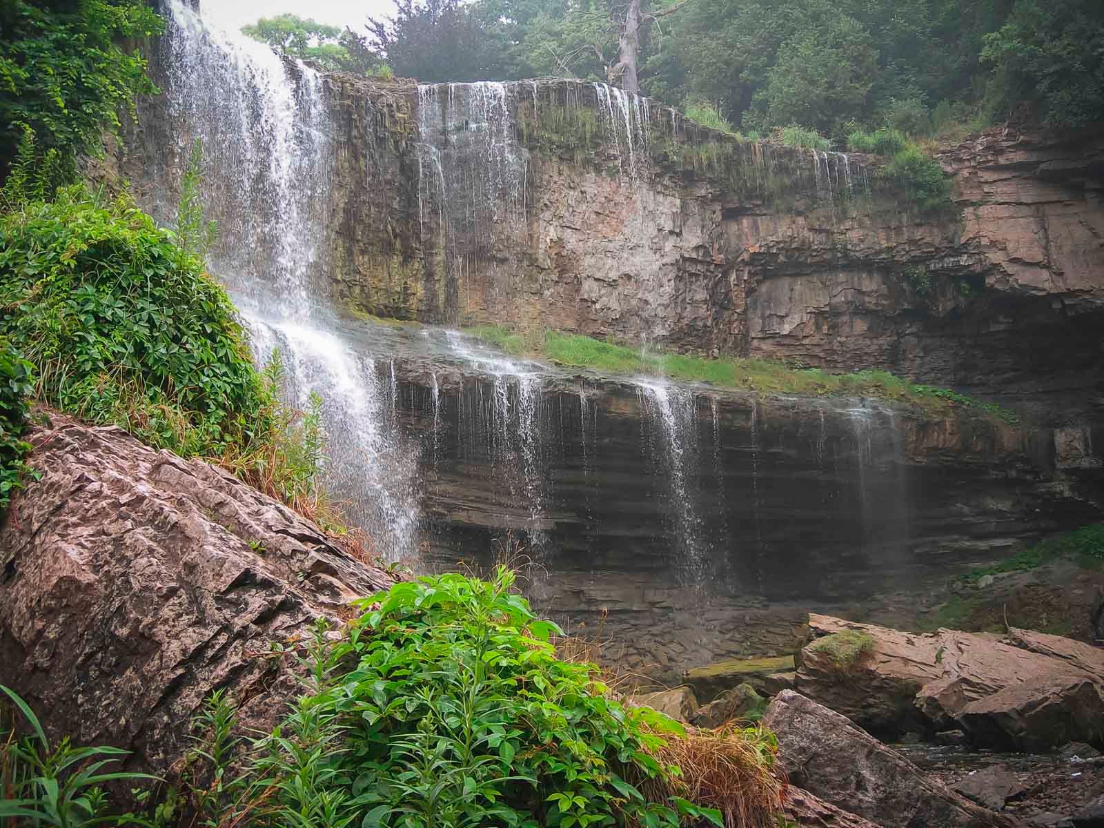 Webster Falls in Hamilton surrounded by fall foliage