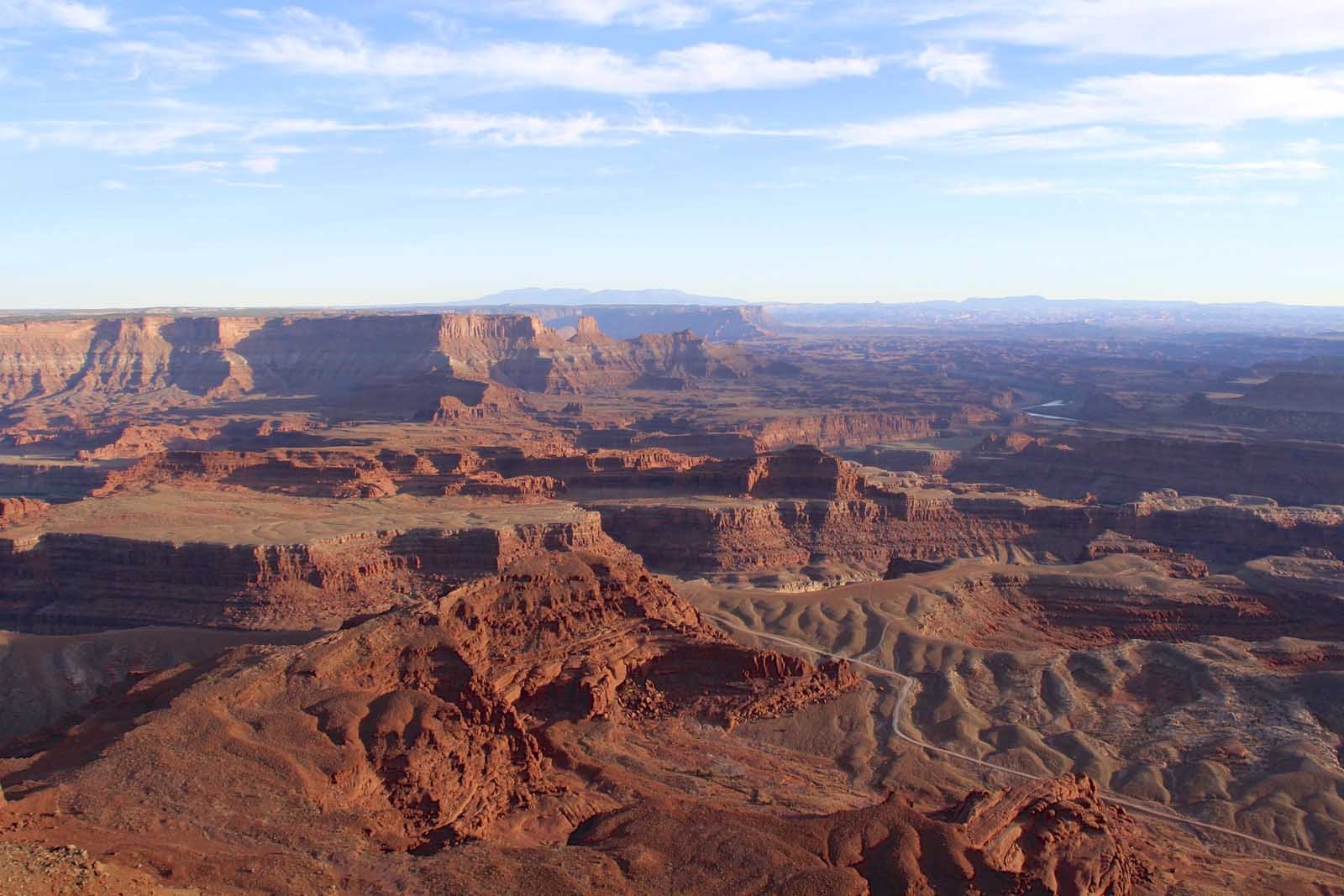 Dead Horse Point Rim Loop hike with views of the Colorado River and canyon below

