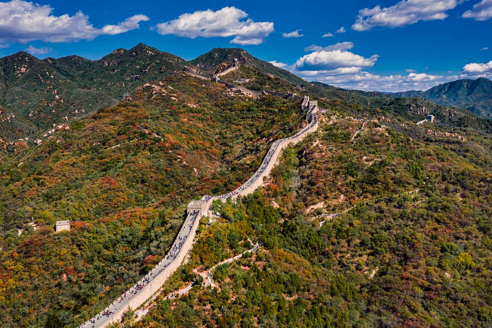 Aerial view of the Great Wall of China winding through mountains