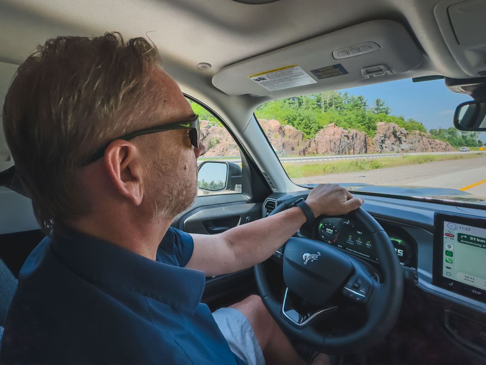 Driving along scenic Northern Ontario highway to reach Sudbury from Toronto
