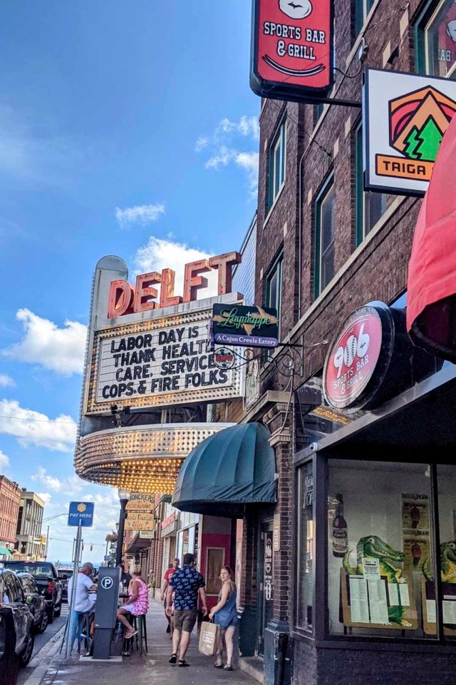 historic downtown marquette theatre against a blue sky, a must-see sight in this charming Upper Peninsula city