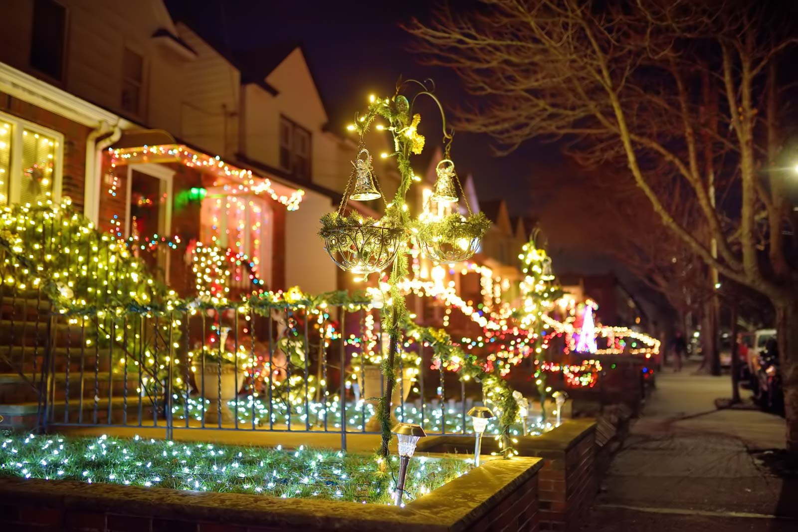 A house in Dyker Heights, Brooklyn, covered in an extravagant and spectacular display of Christmas lights and decorations.