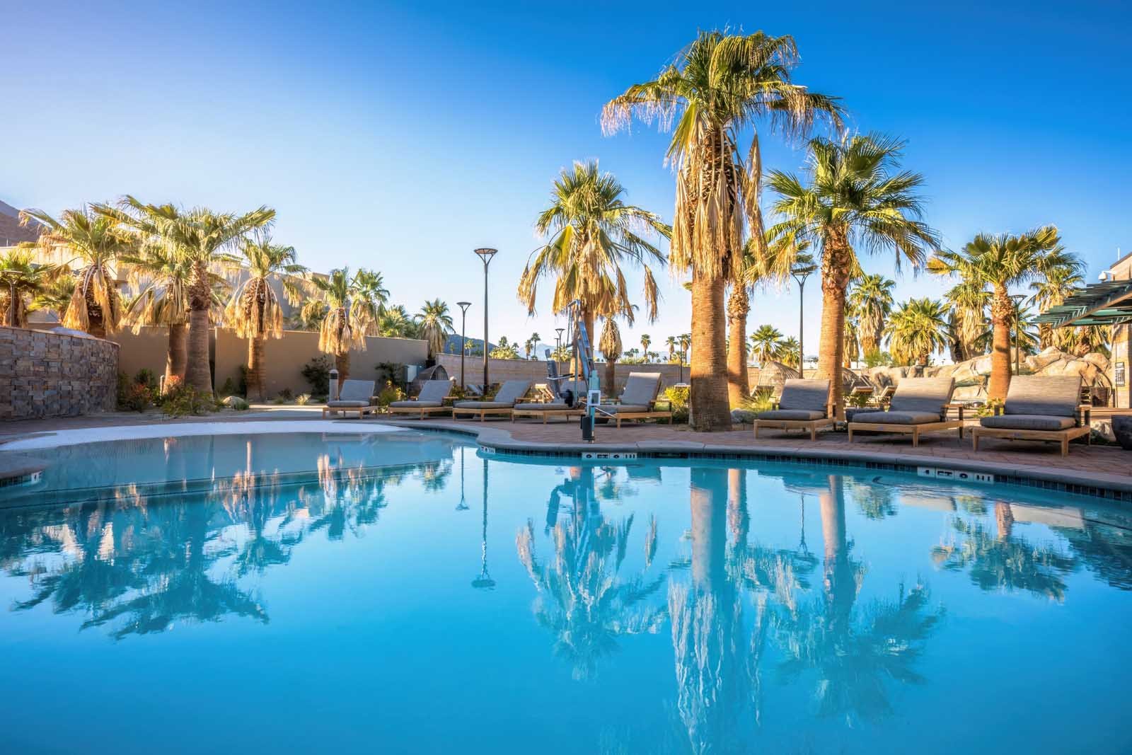 Pool and palm trees in Palm Springs, California